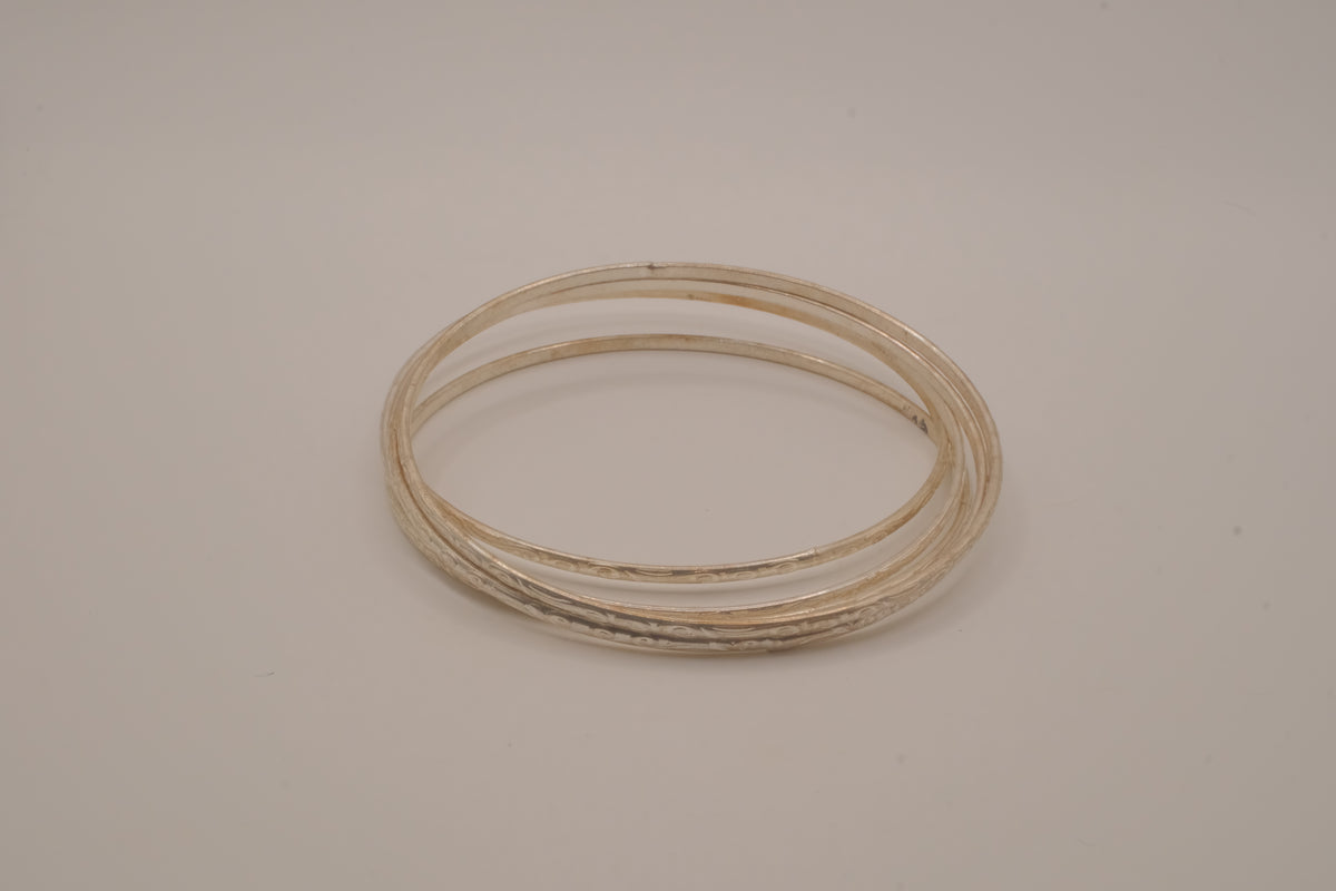 Set of 6 thin, stackable silver bangles