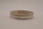 Set of 5 stacked mixed-textures silver &nbsp;tone bangle bracelets