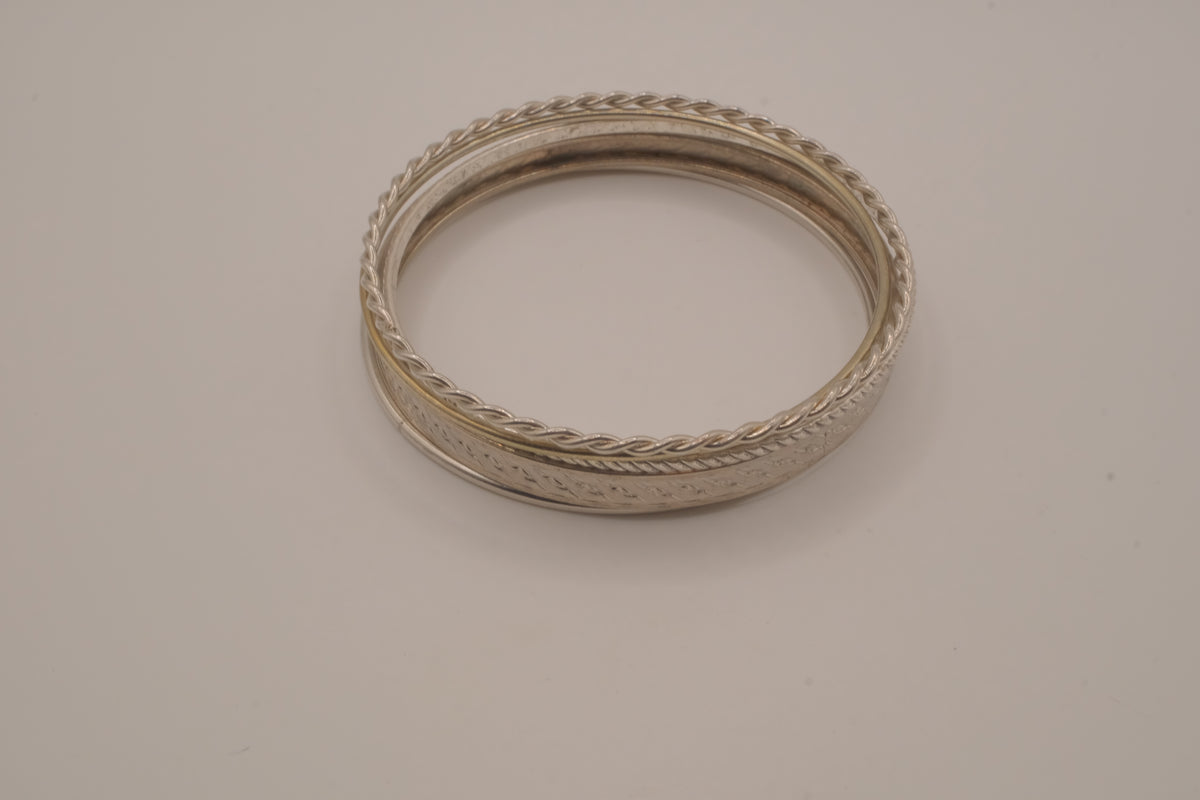 Set of 5 stacked mixed-textures silver &nbsp;tone bangle bracelets