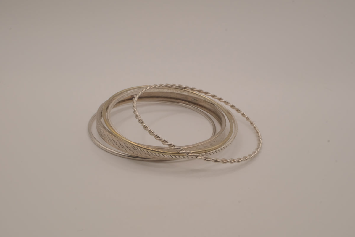 Set of 5 stacked mixed-textures silver &nbsp;tone bangle bracelets