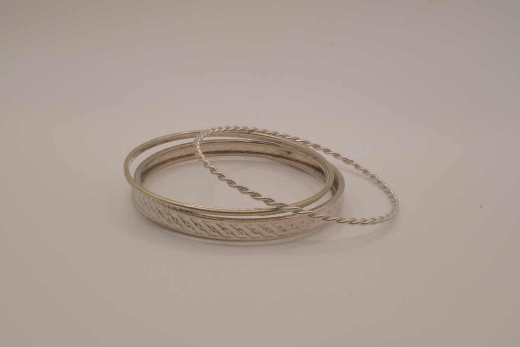 Set of 5 stacked mixed-textures silver &nbsp;tone bangle bracelets