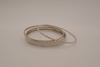 Set of 5 stacked mixed-textures silver &nbsp;tone bangle bracelets