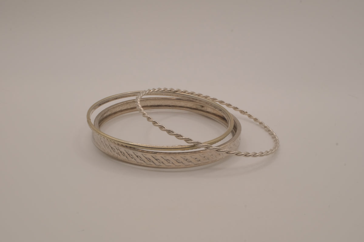 Set of 5 stacked mixed-textures silver &nbsp;tone bangle bracelets