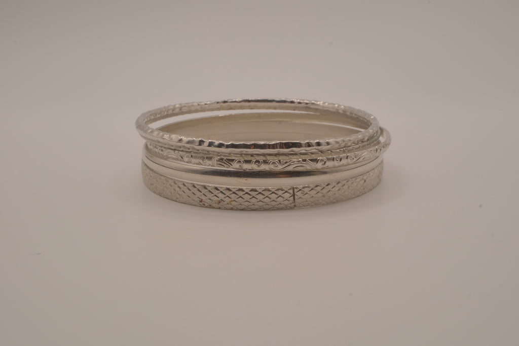 Vintage-style stack of 5 silver tone bangles
