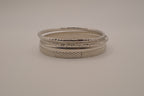 Vintage-style stack of 5 silver tone bangles