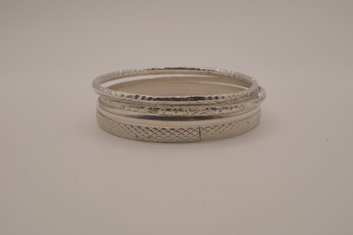 Vintage-style stack of 5 silver tone bangles