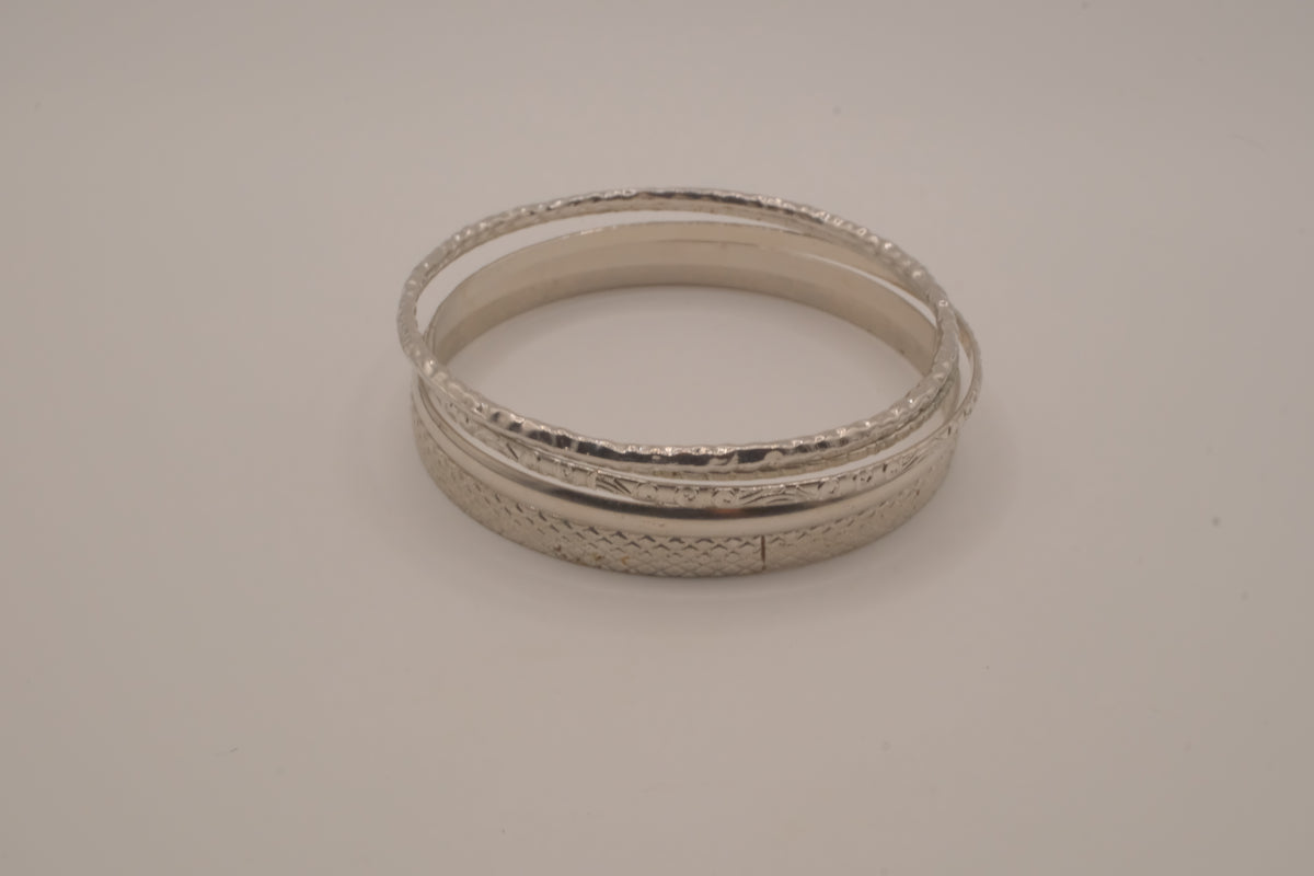 Vintage-style stack of 5 silver tone bangles