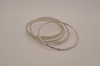 Vintage-style stack of 5 silver tone bangles