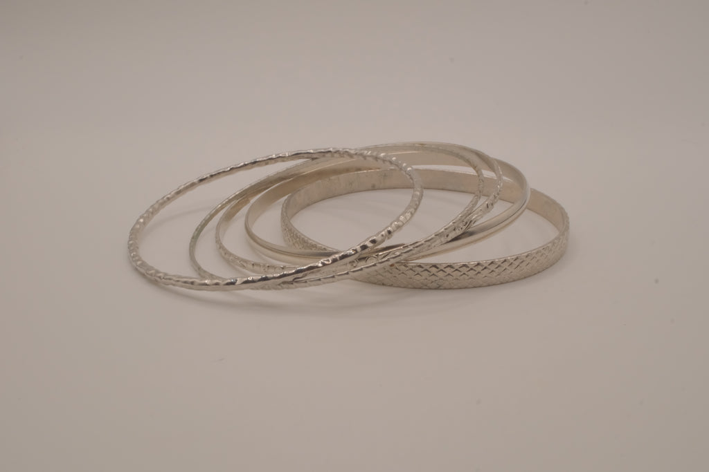 Vintage-style stack of 5 silver tone bangles