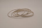 Vintage-style stack of 5 silver tone bangles