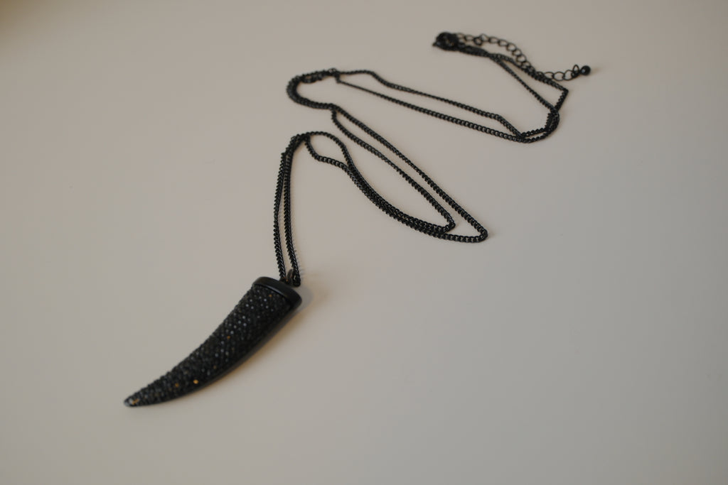 Black pave-encrusted horn/tooth pendant necklace