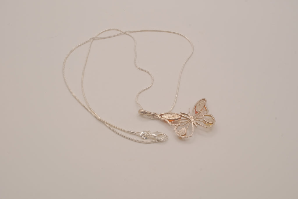 Sterling silver Baltic amber butterfly pendant necklace