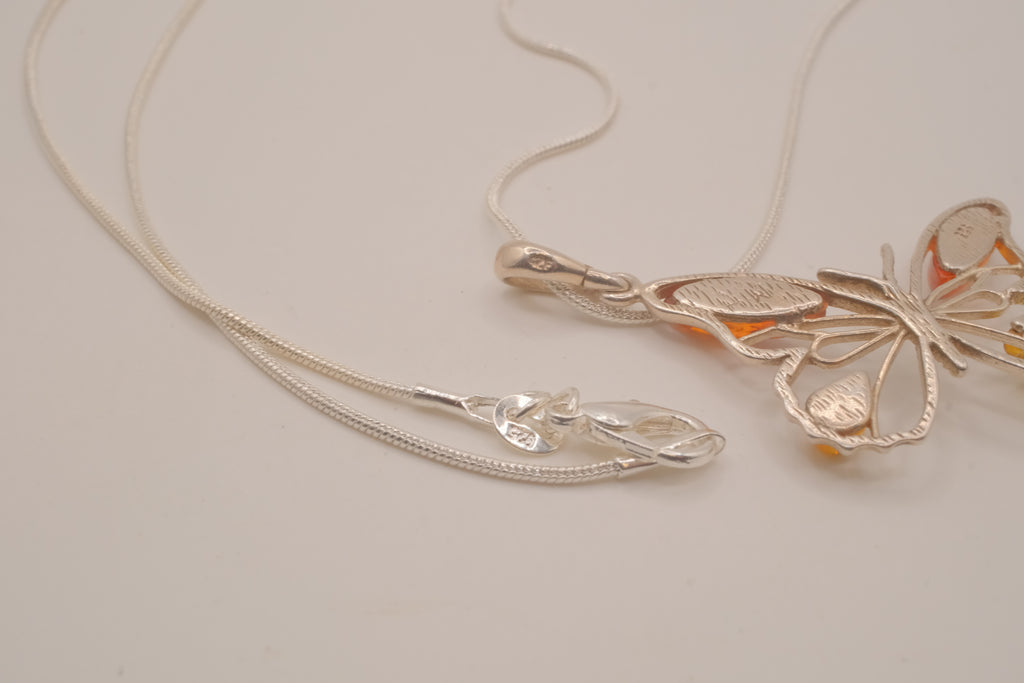Sterling silver Baltic amber butterfly pendant necklace