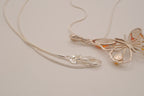 Sterling silver Baltic amber butterfly pendant necklace