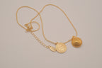 Bizou gold-tone charm necklace