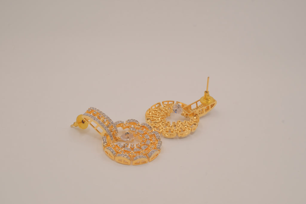 Gold tone white rhinestones dangle earring