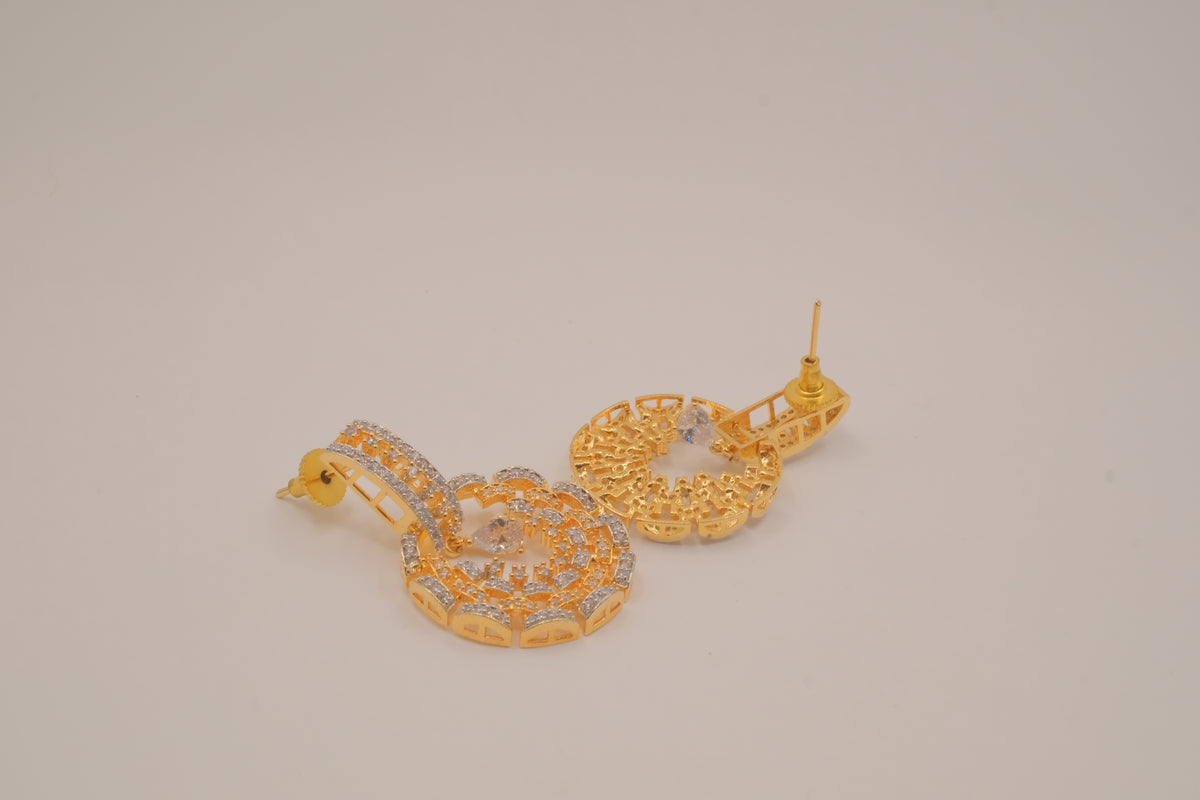 Gold tone white rhinestones dangle earring