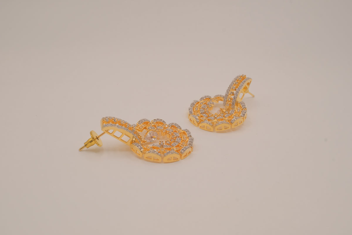 Gold tone white rhinestones dangle earring