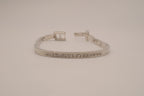 Silver-tone semi-eternity hinged bangle bracelet