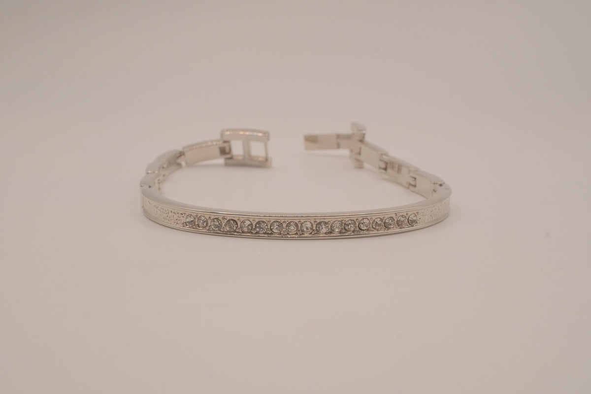 Silver-tone semi-eternity hinged bangle bracelet