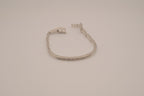 Silver-tone semi-eternity hinged bangle bracelet