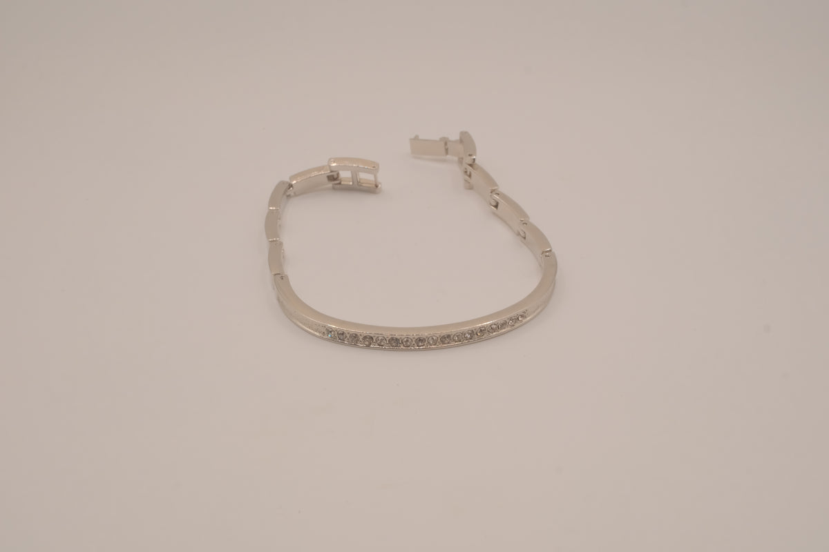 Silver-tone semi-eternity hinged bangle bracelet