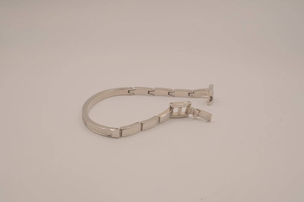 Silver-tone semi-eternity hinged bangle bracelet