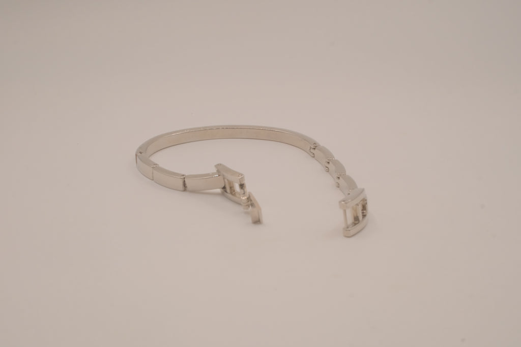 Silver-tone semi-eternity hinged bangle bracelet