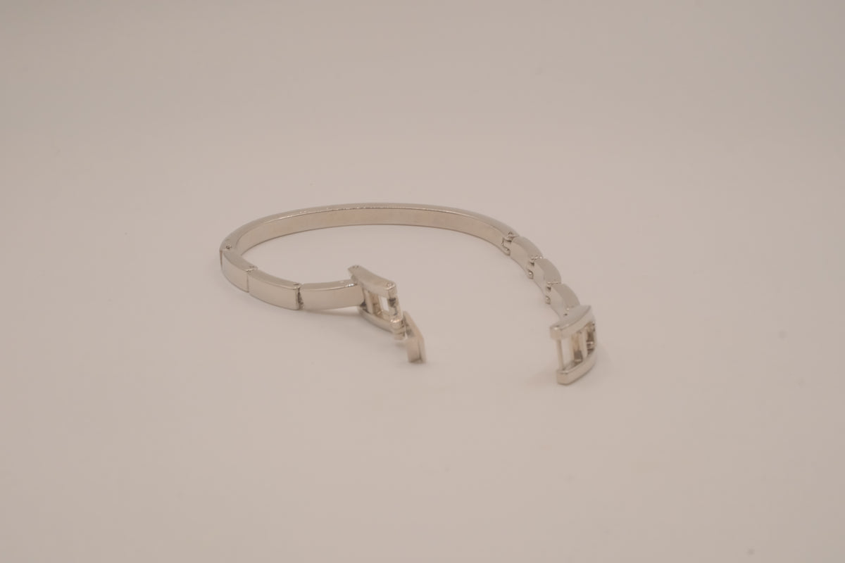 Silver-tone semi-eternity hinged bangle bracelet