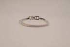 Silver-tone semi-eternity hinged bangle bracelet