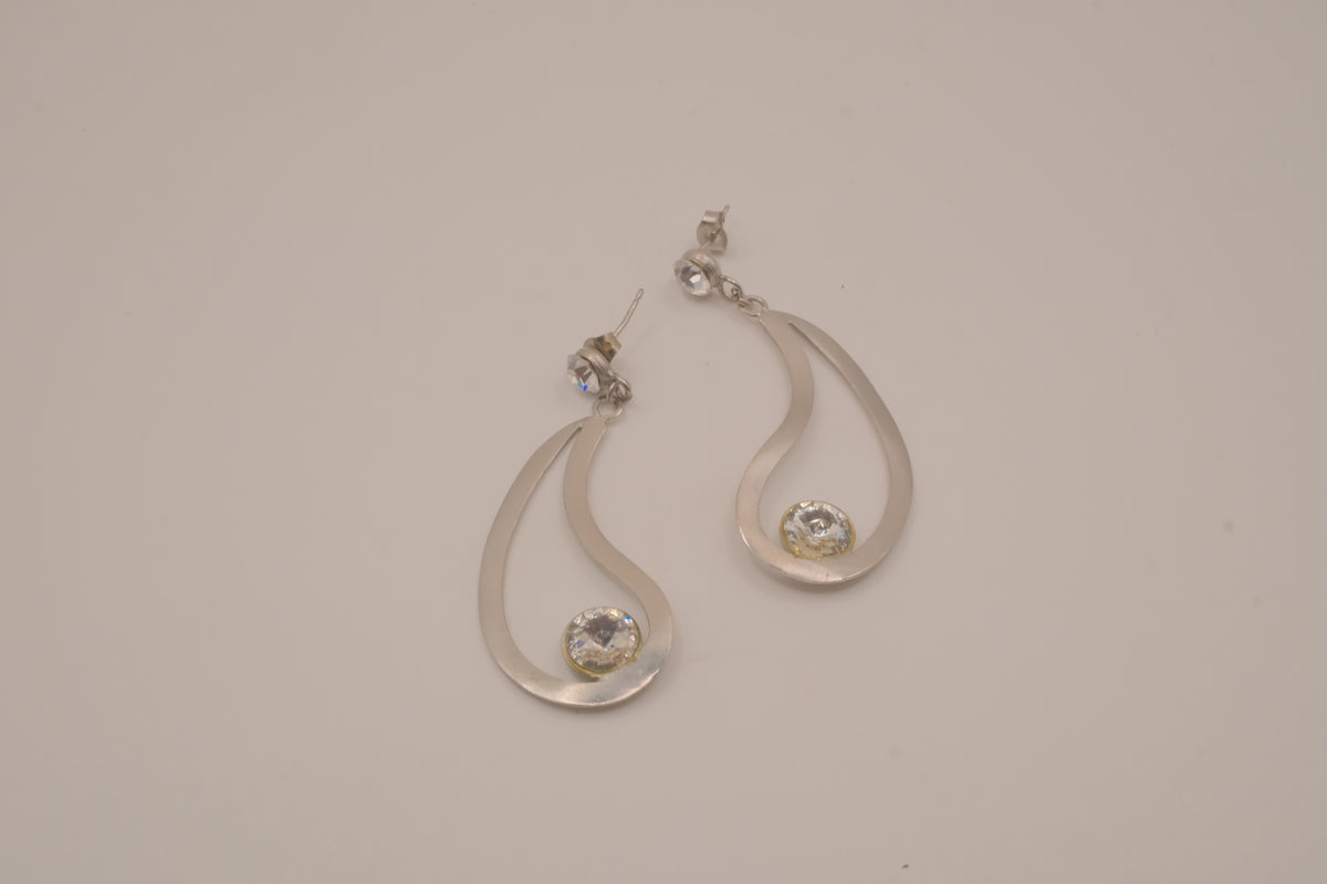 Silver tone teardrop open-frame dangle earrings