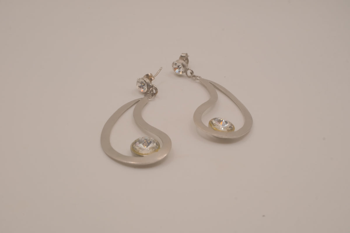 Silver tone teardrop open-frame dangle earrings