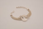 Silver tone multi-strand bracelet