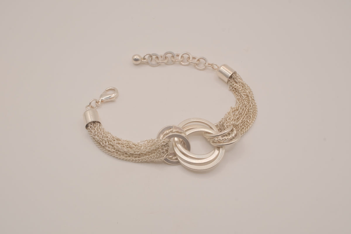 Silver tone multi-strand bracelet