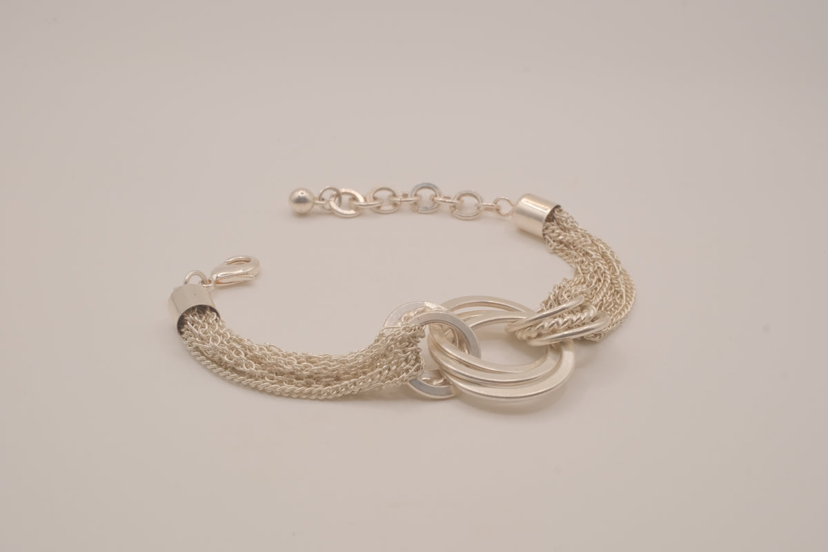 Silver tone multi-strand bracelet
