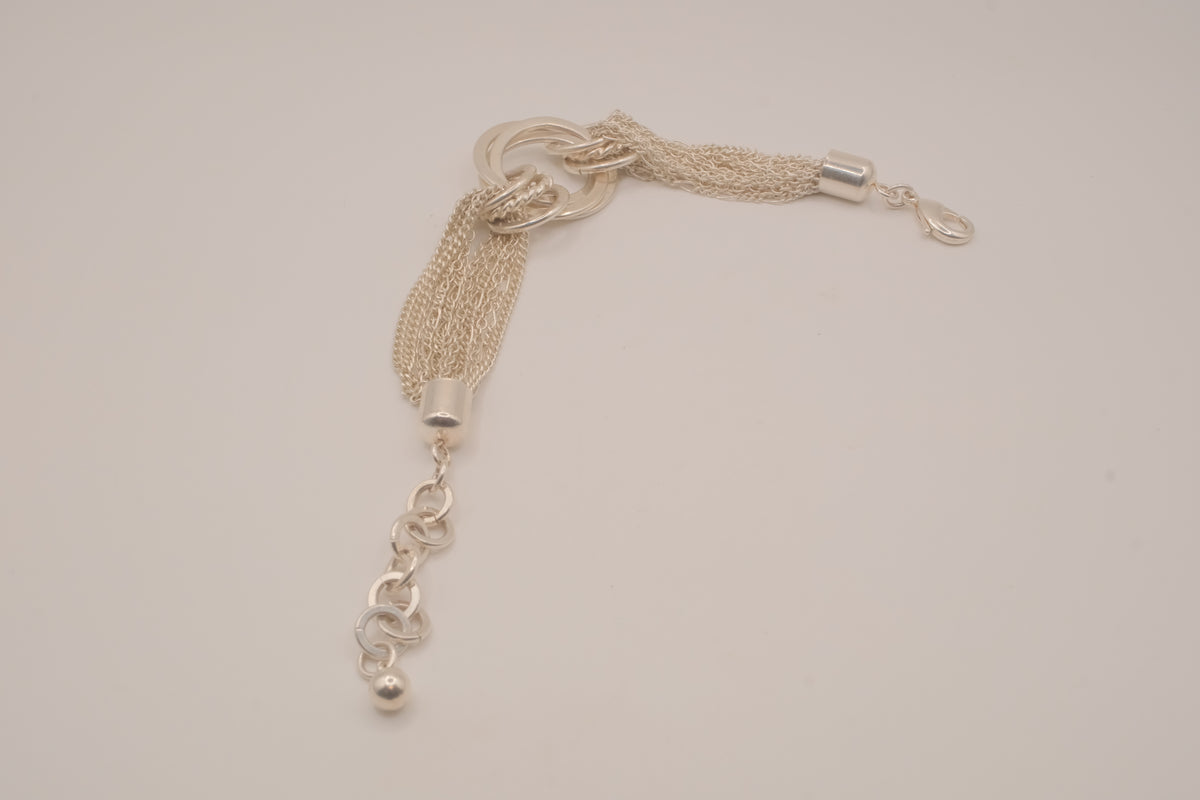 Silver tone multi-strand bracelet