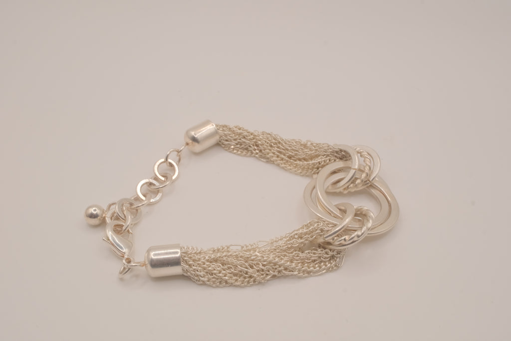 Silver tone multi-strand bracelet
