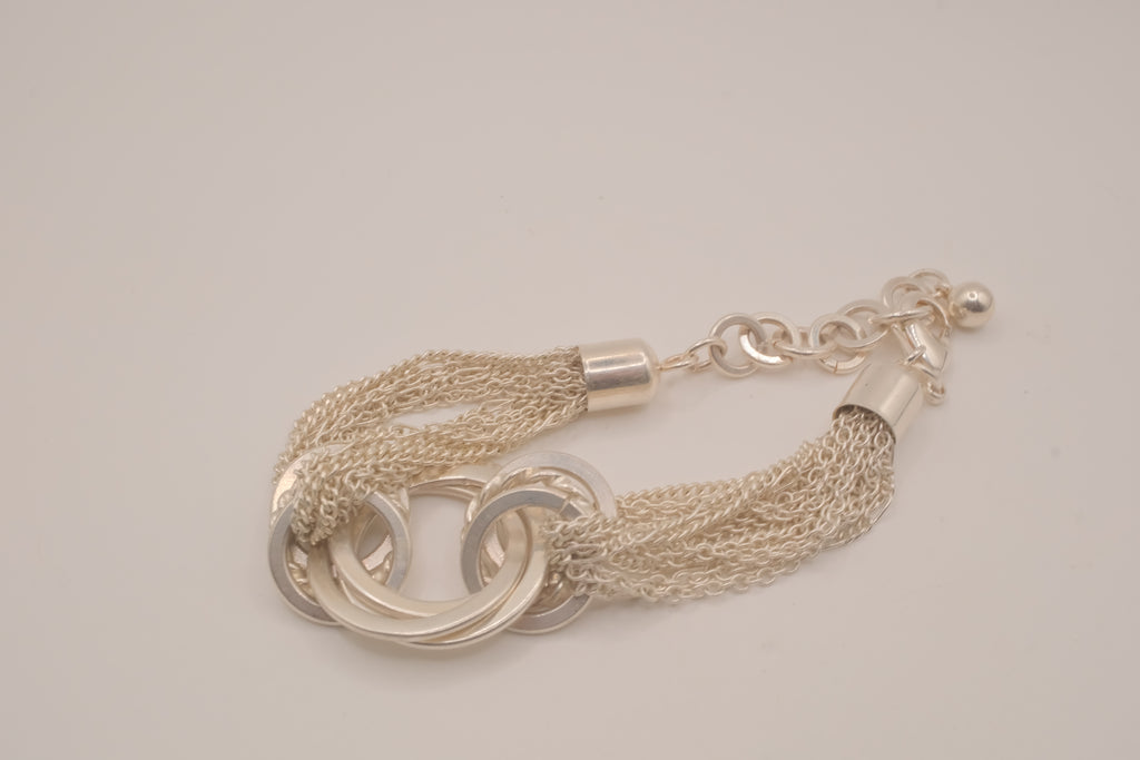 Silver tone multi-strand bracelet