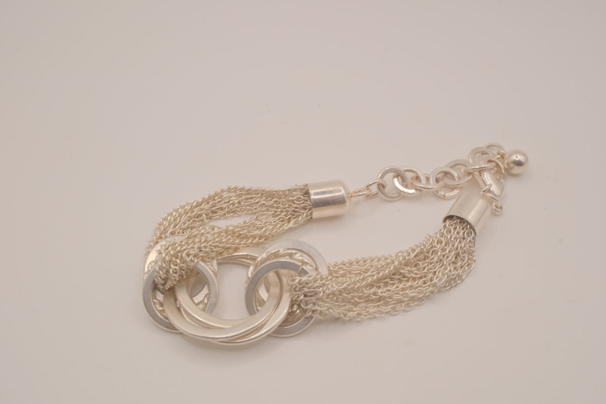 Silver tone multi-strand bracelet