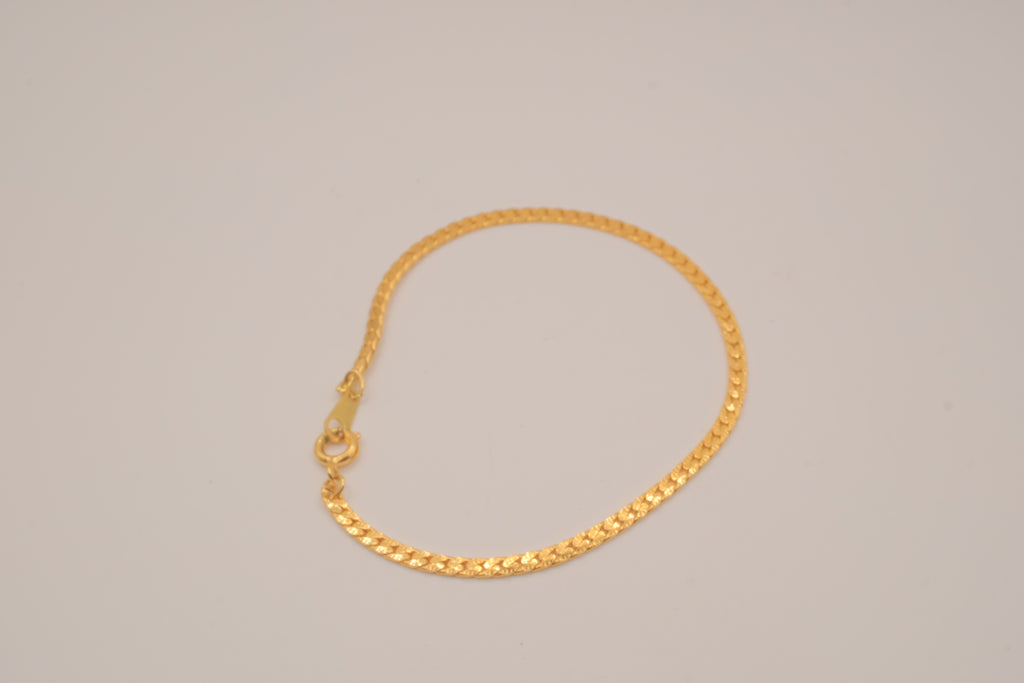 Gold tone herringbone chain bracelet