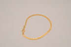 Gold tone herringbone chain bracelet
