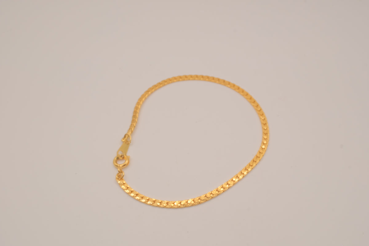 Gold tone herringbone chain bracelet