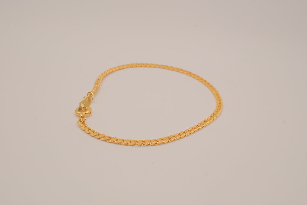 Gold tone herringbone chain bracelet