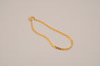 Gold tone herringbone chain bracelet