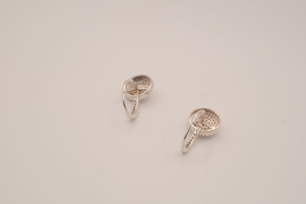 Sterling silver evil eye hoop earring