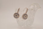 Sterling silver evil eye hoop earring