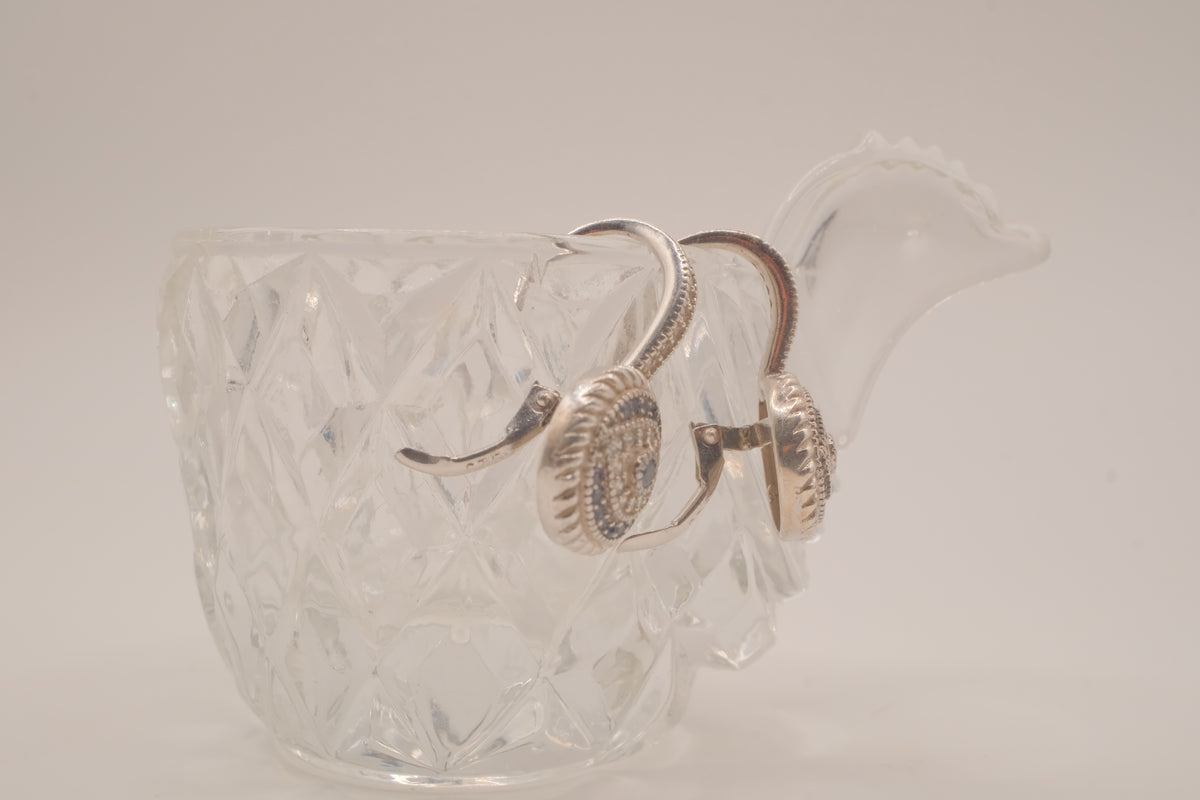 Sterling silver evil eye hoop earring