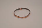 Handcrafted twisted copper arm cuff