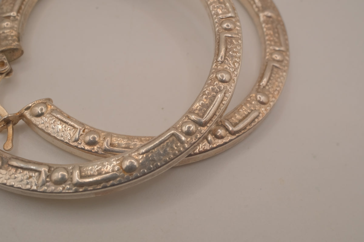 Sterling silver textured, flat-sided hoop earrings