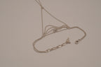 Silver tone white rhinestones hand chain